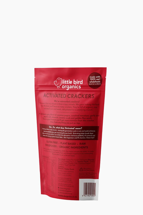 Red package of little bird organics Activated Crackers on a white background