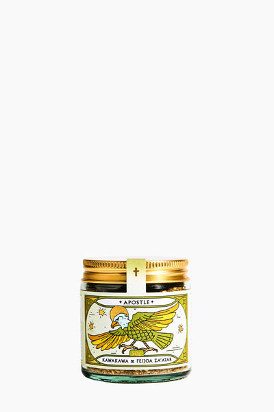 Jar with a gold lid and decorative label on a white background