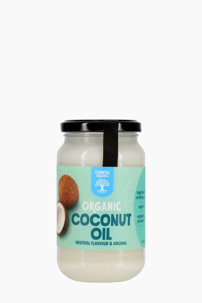 Jar of organic coconut oil with a label on a white background