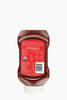 Ketchup bottle with label on a white background