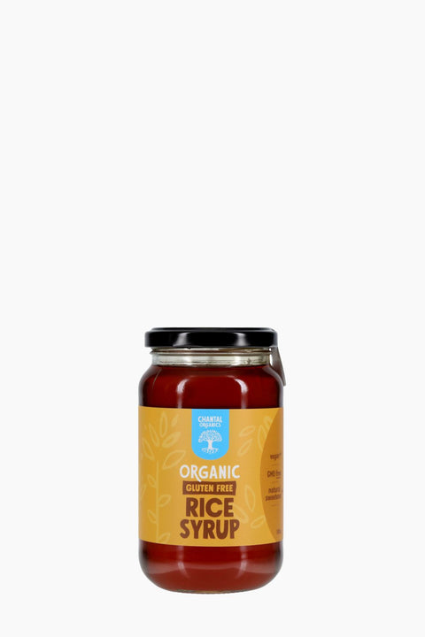 Jar of organic rice syrup on a white background