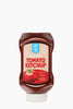 Bottle of organic tomato ketchup with a label on a white background