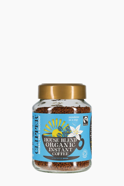 Jar of house blend organic instant coffee with a blue label on a white background