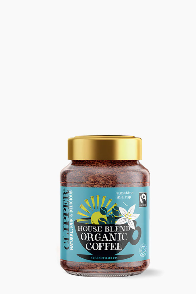 Jar of house blend organic coffee with a gold lid on a white background