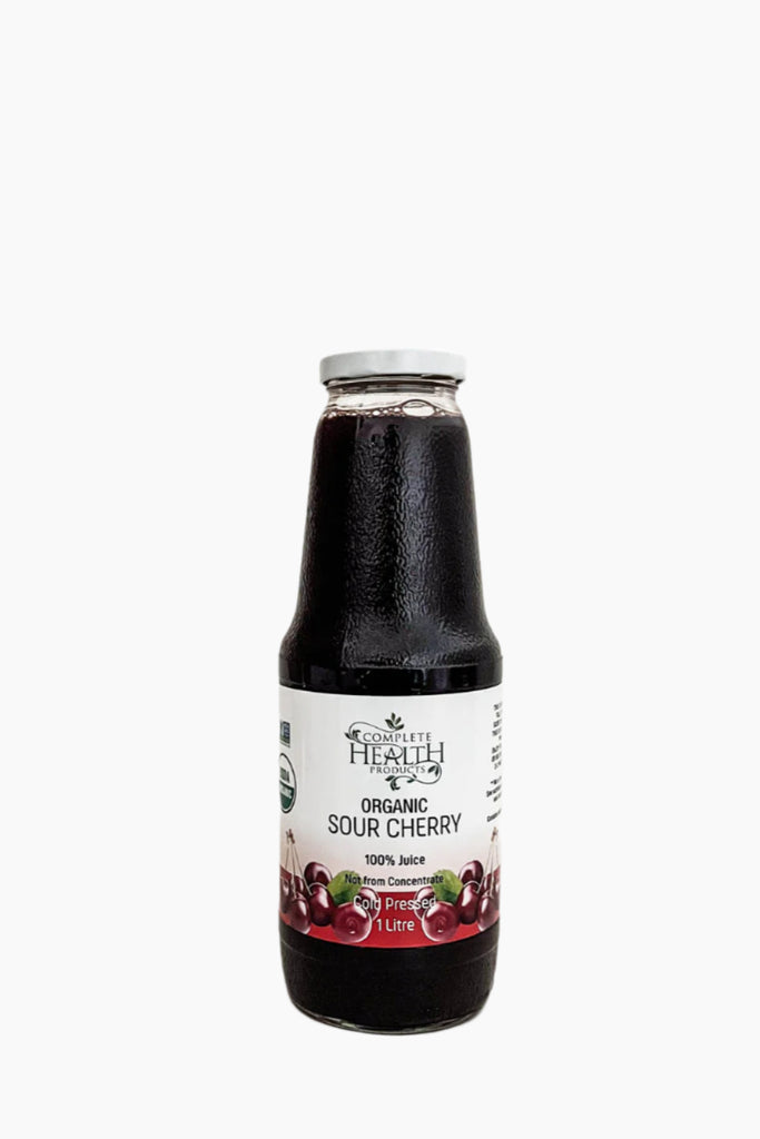 A bottle of Complete Health Organic 100 Percent Sour Cherry Juice with a white and red label, indicating it is not diluted or made from concentrate.