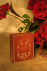 Red book titled 'THAT'S GOLD' with red roses in the background