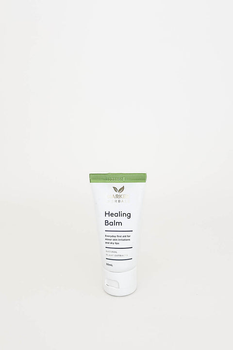 A tube of Healing Balm by Tui, displayed against a white background.