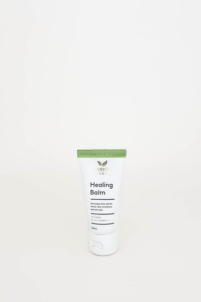 A tube of Healing Balm by Tui, displayed against a white background.