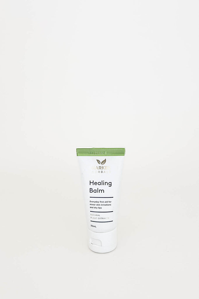 A tube of Healing Balm by Tui, displayed against a white background.