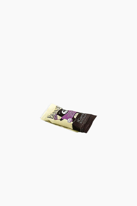 A packaged vegan coconut carob bar against a white background.