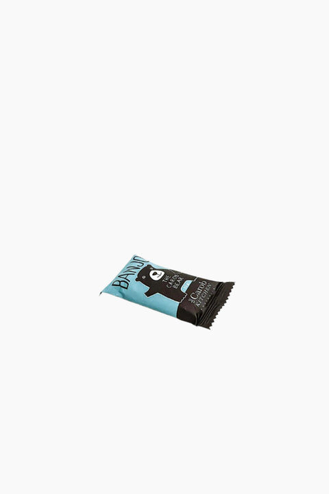 A packaged candy bar with branding visible, set against a plain background.