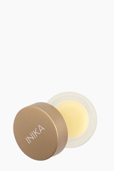INIKA makeup product on a beige background