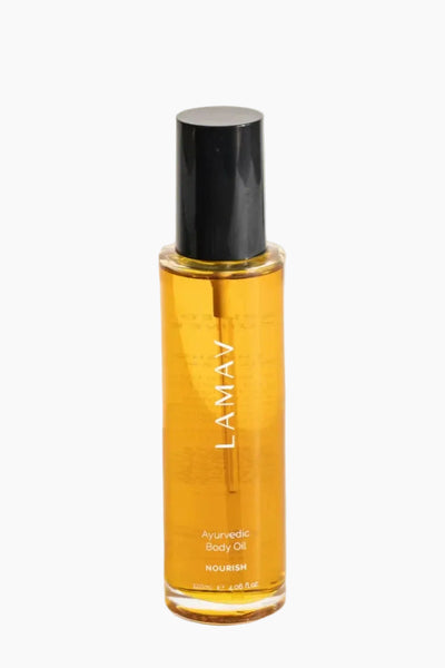 Bottle of LAMAV body oil on a white background