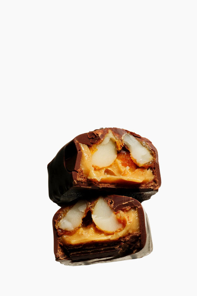 Close-up of a chocolate-covered treat with a white background