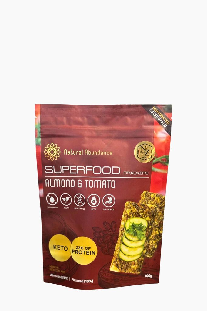 Superfood almond and tomato crackers packaging on a white background