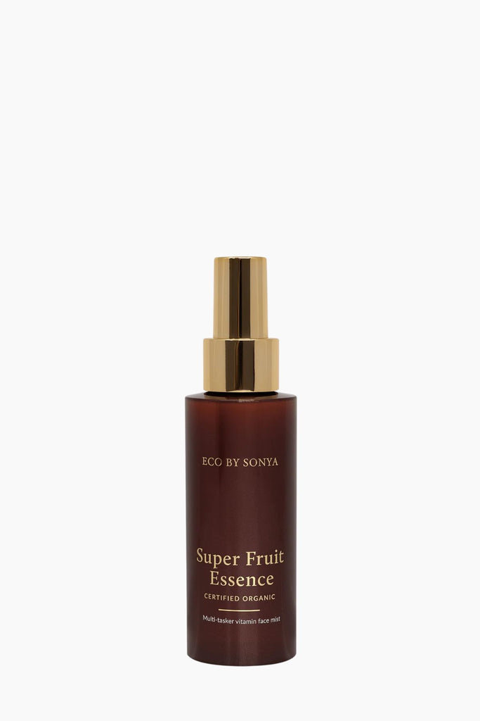 Bottle of 'Super Fruit Essence' with gold cap on a white background