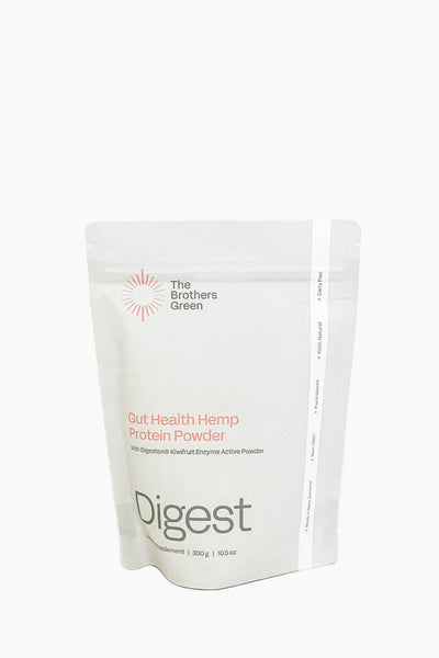 A sealed pouch of The Brothers Green Digest Protein Powder with a label showing the product name and 'Digest' which is highlighted in a different color.