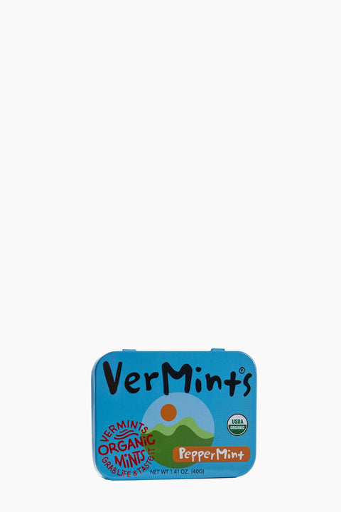 A VerMints organic peppermint grapefruit snack tin with a blue background and a colorful landscape graphic, shown on a plain white background.