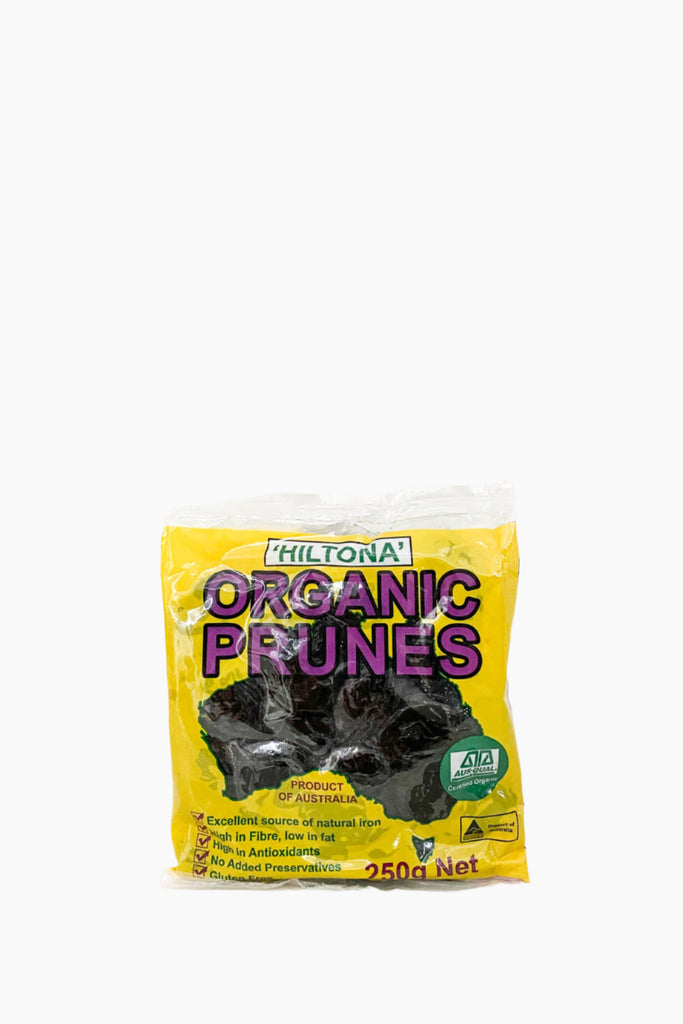 A package of Hiltona Organic Prunes, 250g net weight, with a yellow and green label.